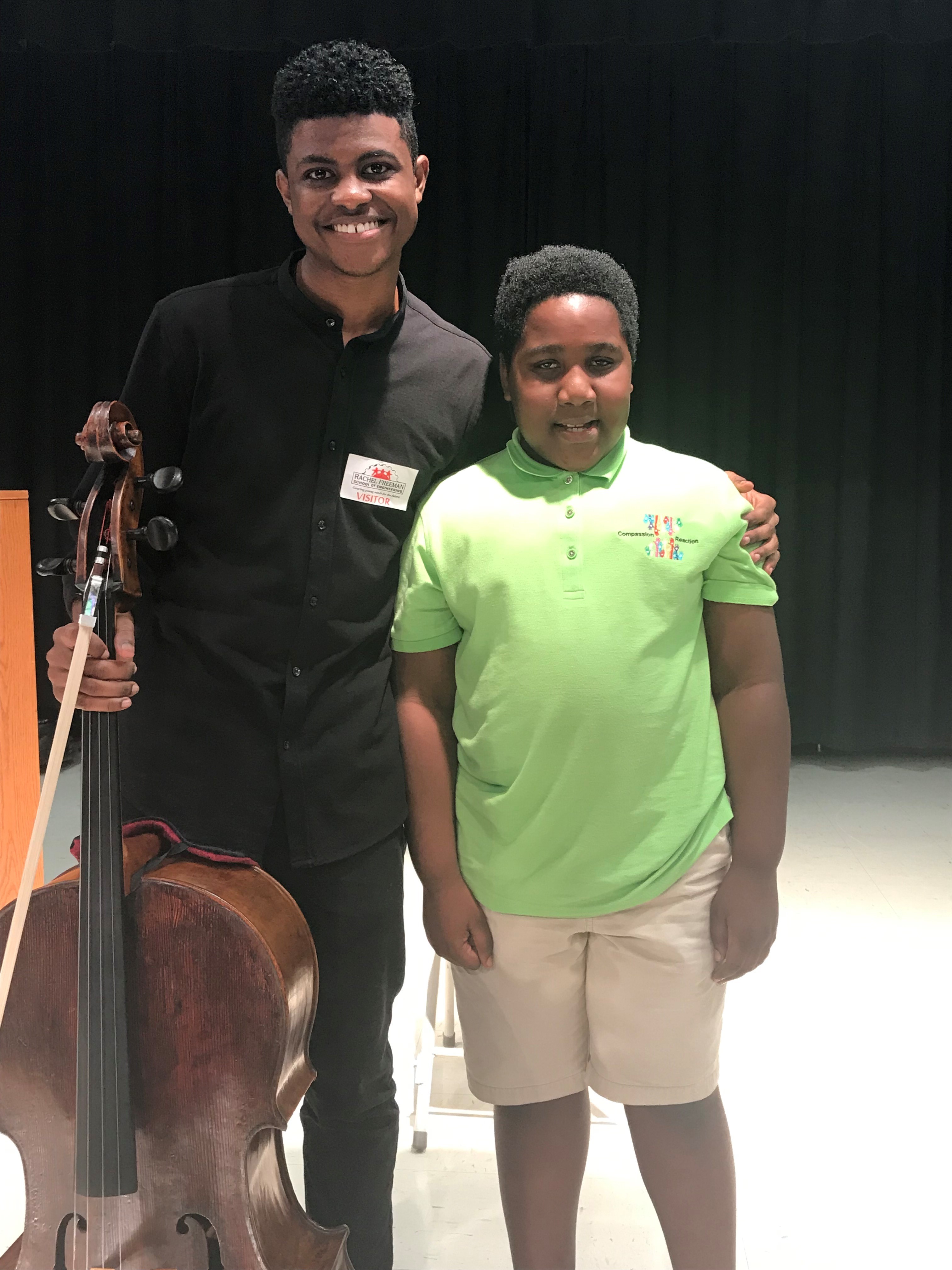 Cellist Sterling Elliott with Snipes Academy student